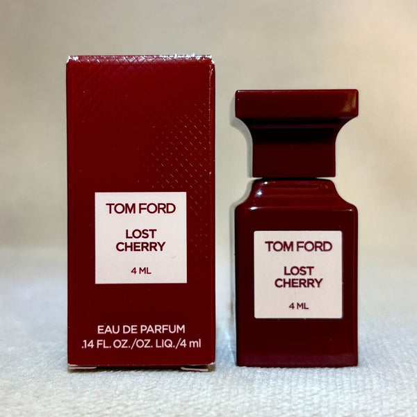 Close-up of Tom Ford Lost Cherry Eau De Parfum 4ml miniature bottle with signature deep red glass and label

4ml Tom Ford Lost Cherry perfume bottle displayed with luxury packaging

Small-sized cherry-themed perfume bottle by Tom Ford with elegant design.

